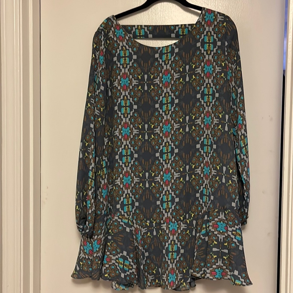 Long sleeve peplum style dress